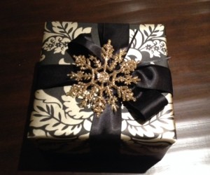 Damask Wallpaper with Black Satin Ribbon and Gold Glitter Snowflake