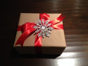 Brown Kraft Paper with Red Satin Ribbon and Silver Glittery Snowflake